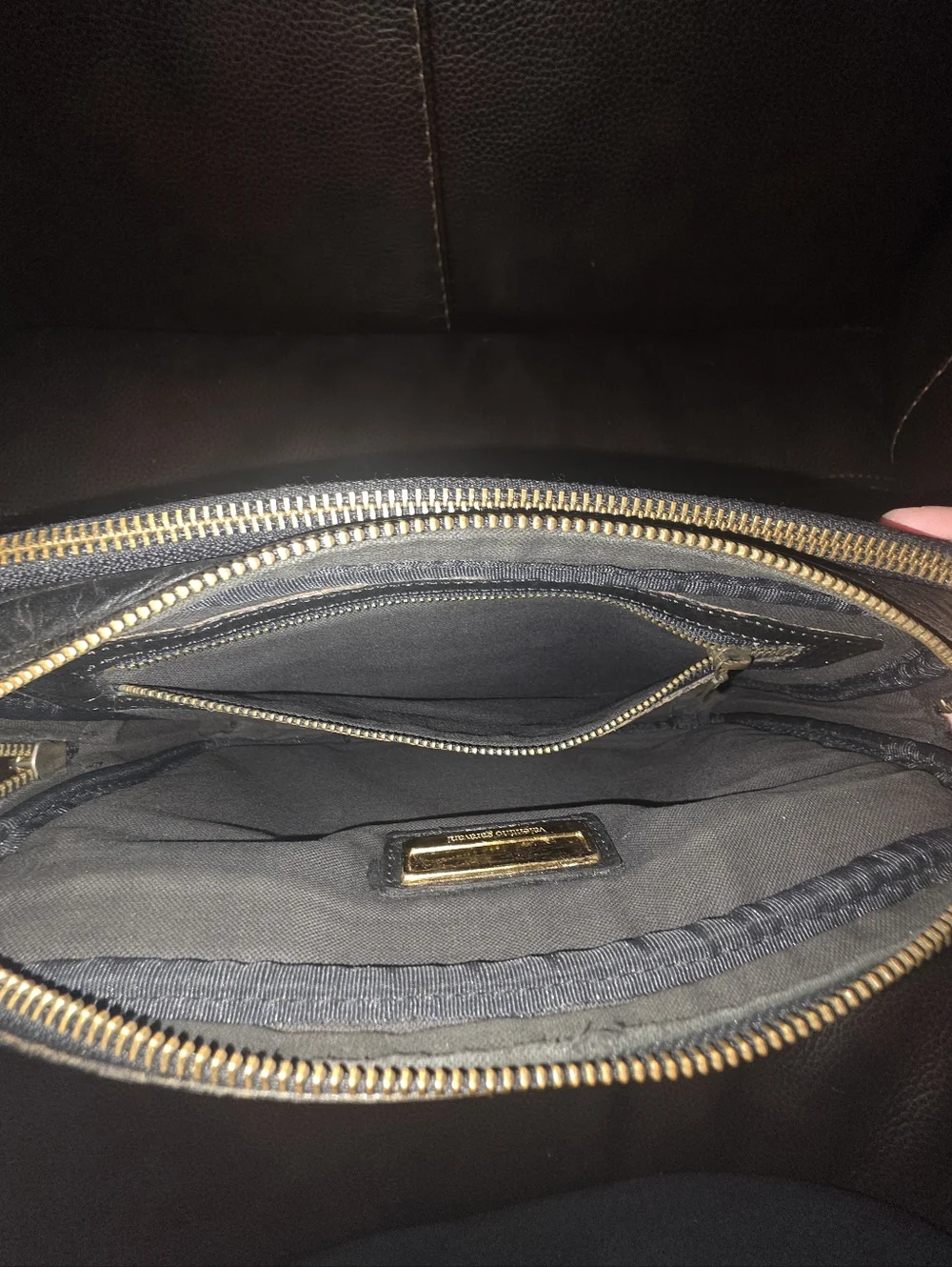 Valentino Garavani Black Leather Bag: Clutch, Dopp, or Organizer